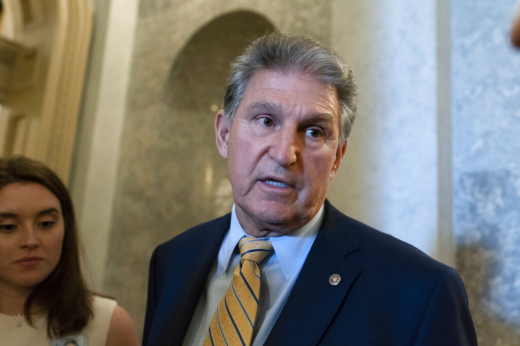 Sen. Joe Manchin, D-W.Va., talks with reporters as the Senate voted on a key test vote on the For the People Act