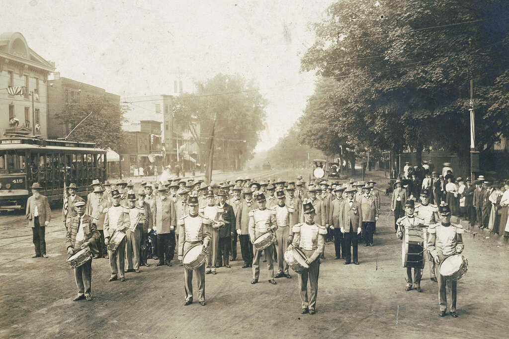 July 4, 1910 photo made available by the Library of Congress, United Confederate Veterans from the Civil War march with drummers down a street in Petersburg, Va.