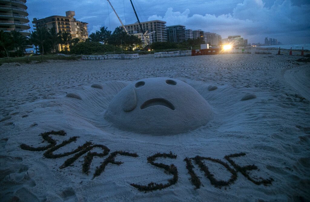 Sand Sculpture near collapsed condo site
