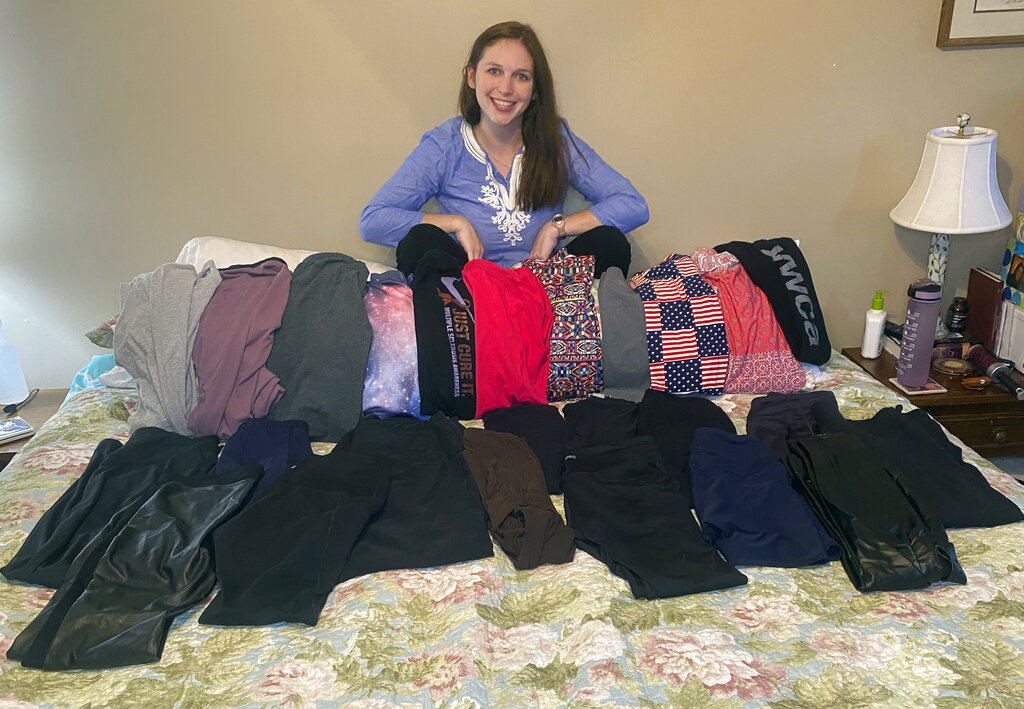 Cameron Howe at home in Lynchburg, Va. with her collection of leggings purchased during the pandemic.