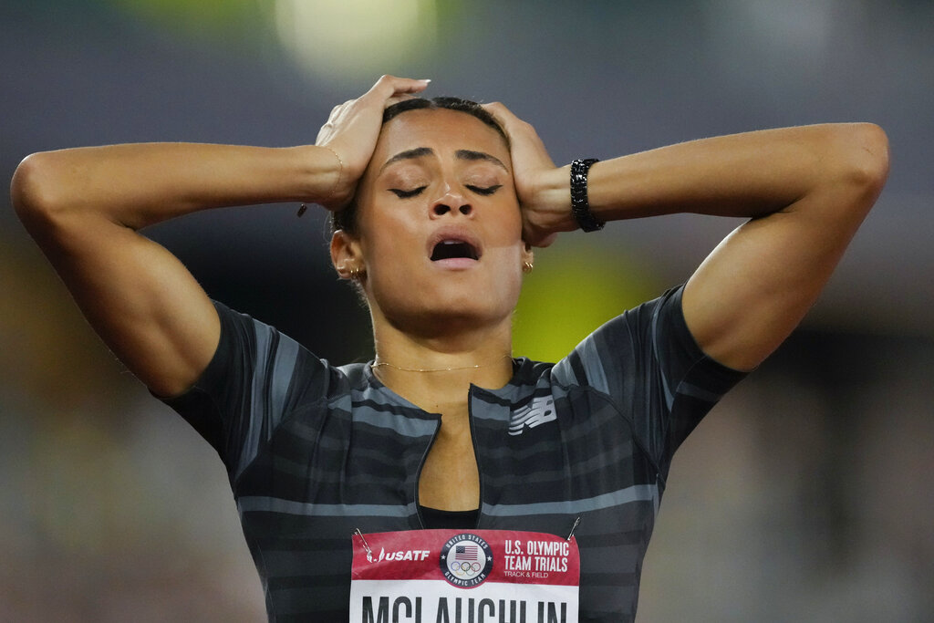 Sydney McLaughlin reacts after setting a new world record in the finals of the women's 400-meter hurdles at the U.S. Olympic Track and Field Trials in Eugene, Ore. 