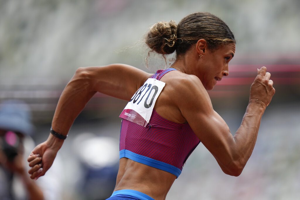 Sydney McLaughlin, of the United States, wins the women