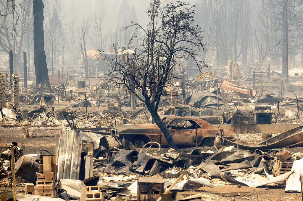 Home and cars destroyed by Dixie Fire