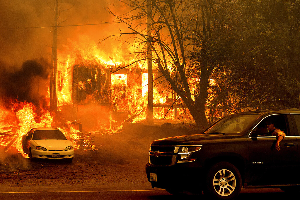 Flames consume home at Dixie Fire