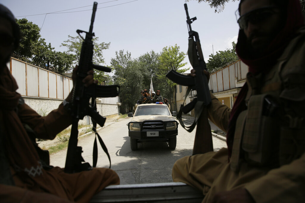 Taliban fighters patrol in Kabul