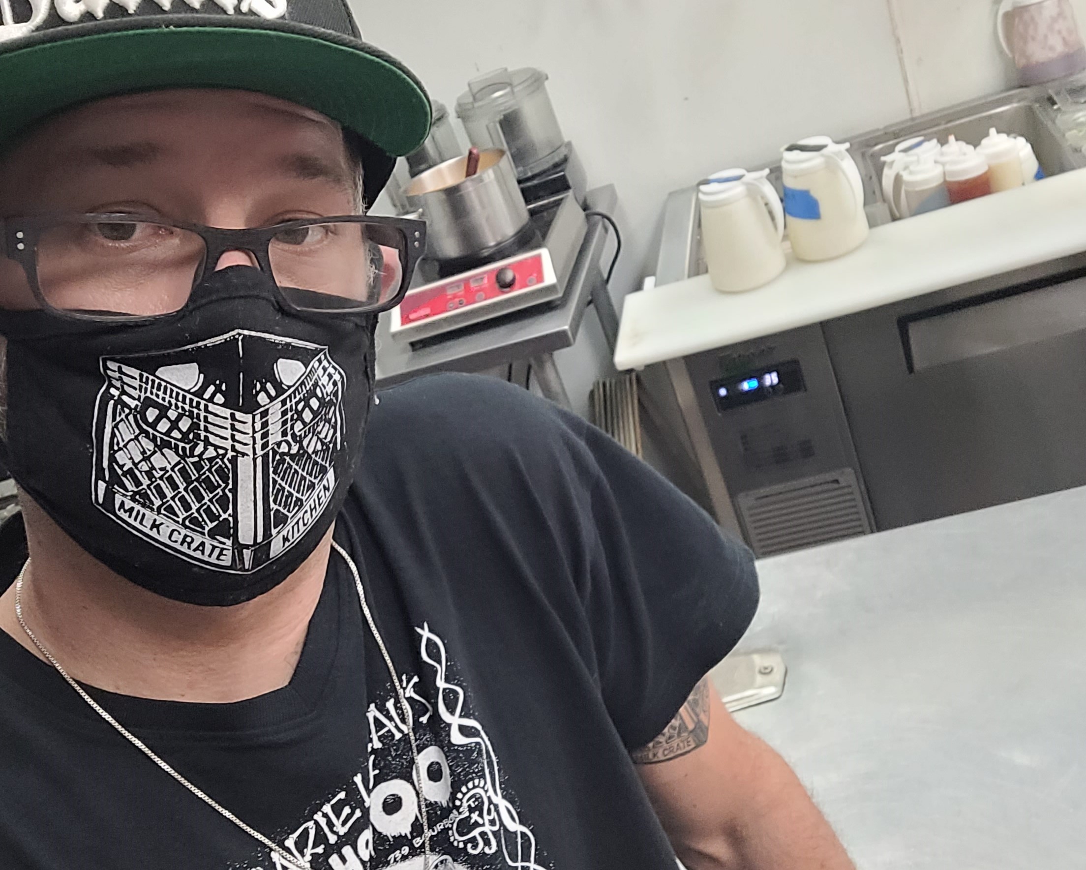Chef Michael Casper in the kitchen with mask on
