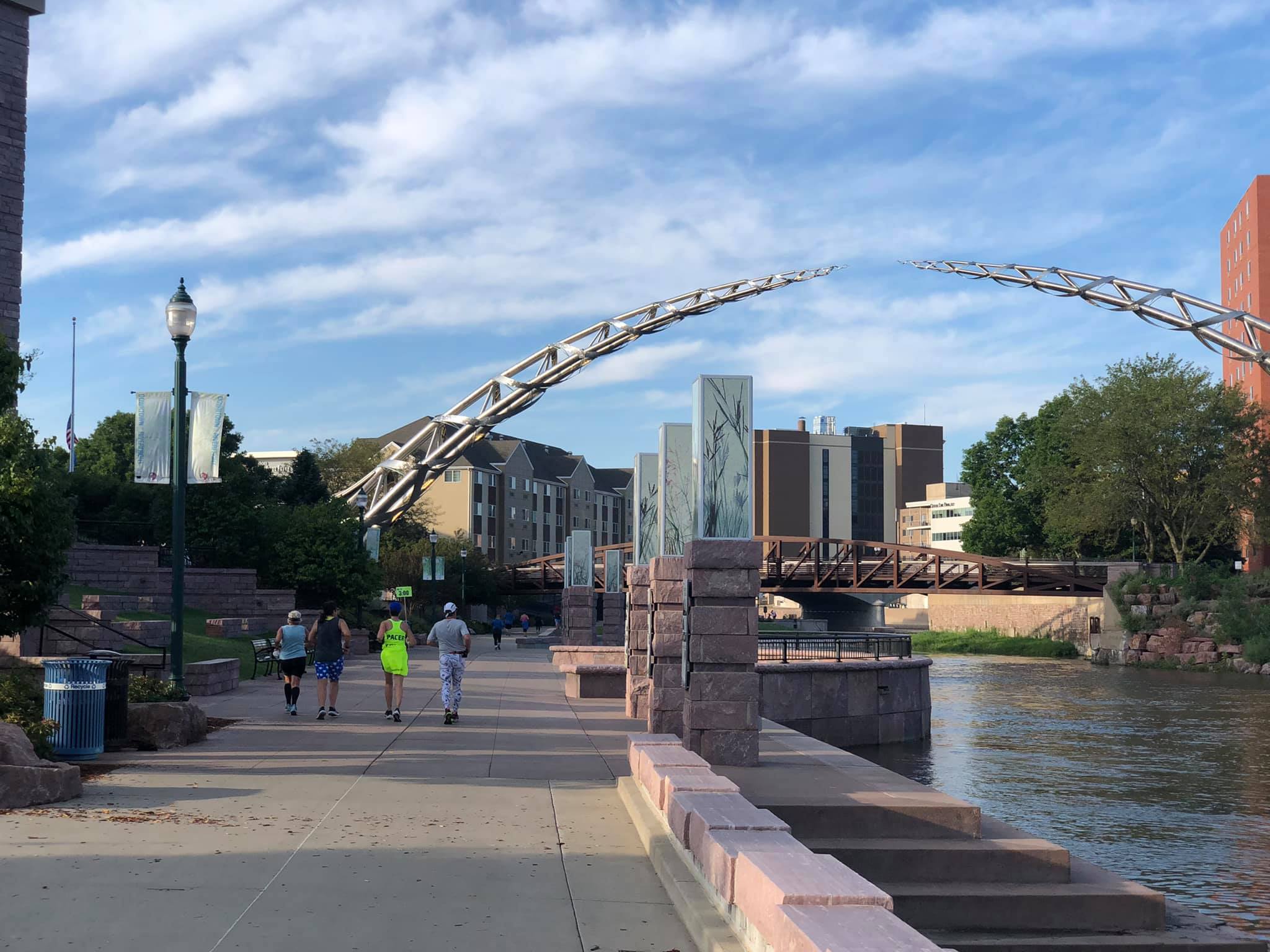 This picture was taken during the Sioux Falls Marathon at the Arc Of Dreams, about half-way point of the course. Very fitting name! This landmark was created by South Dakota Artist Laureate, Dale Claude Lamphere and the sculpture is a tribute to the dreamers of the past, present and an inspiration to the dreamers of the future.