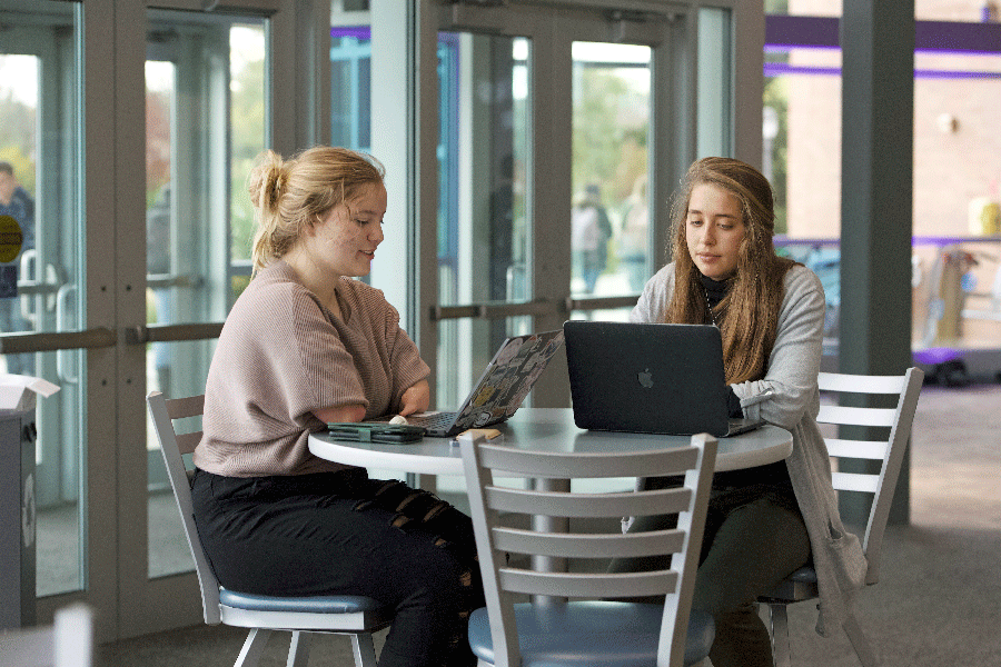 Marissa studying in the Center for Biblical and and Theological Studies Building with Anna Grace Galkin