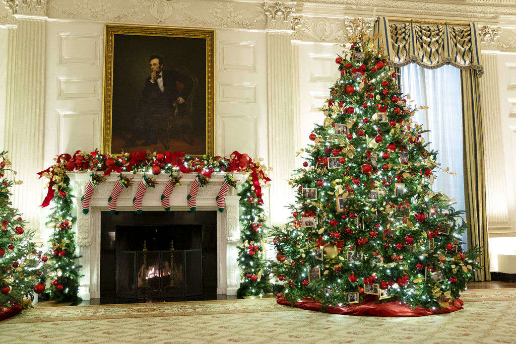 The East Room of the White House is decorated for the holiday season during a press preview of the White House holiday decorations