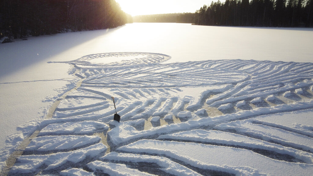 Shovel in lake art drawing of frozen lake in Finland