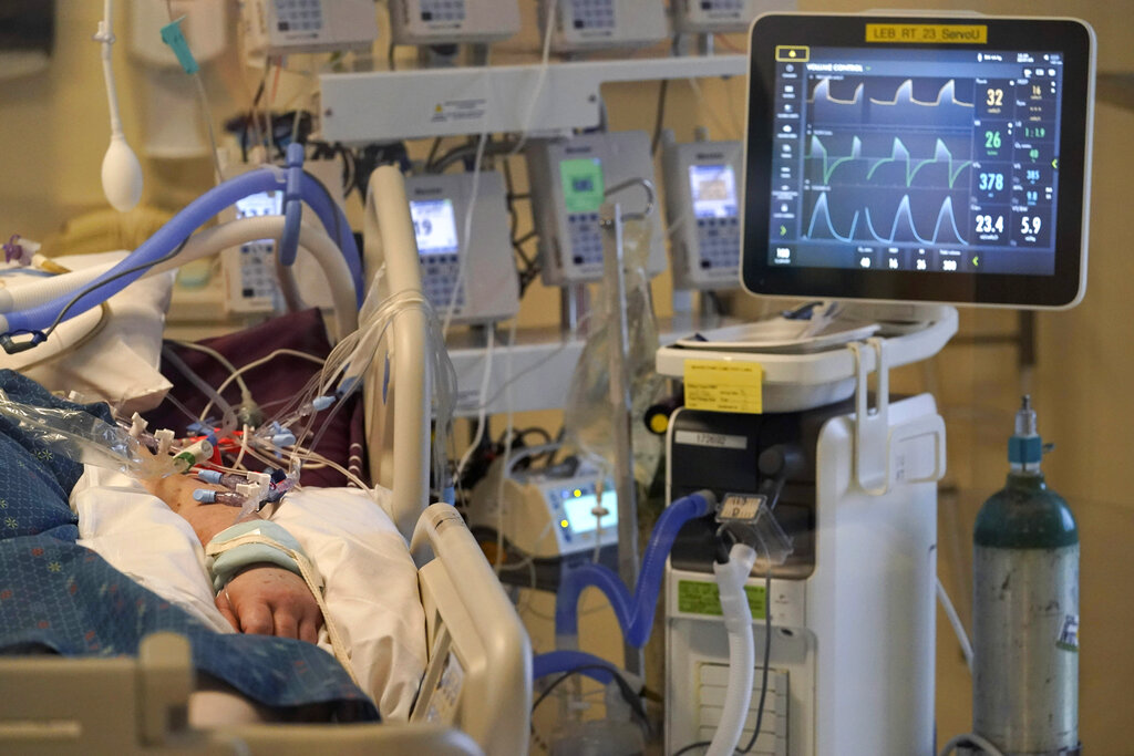 An unidentified COVID-19 patient is attached to life-support systems in the COVID-19 Intensive Care Unit at Dartmouth-Hitchcock Medical Center, in Lebanon, N.H.