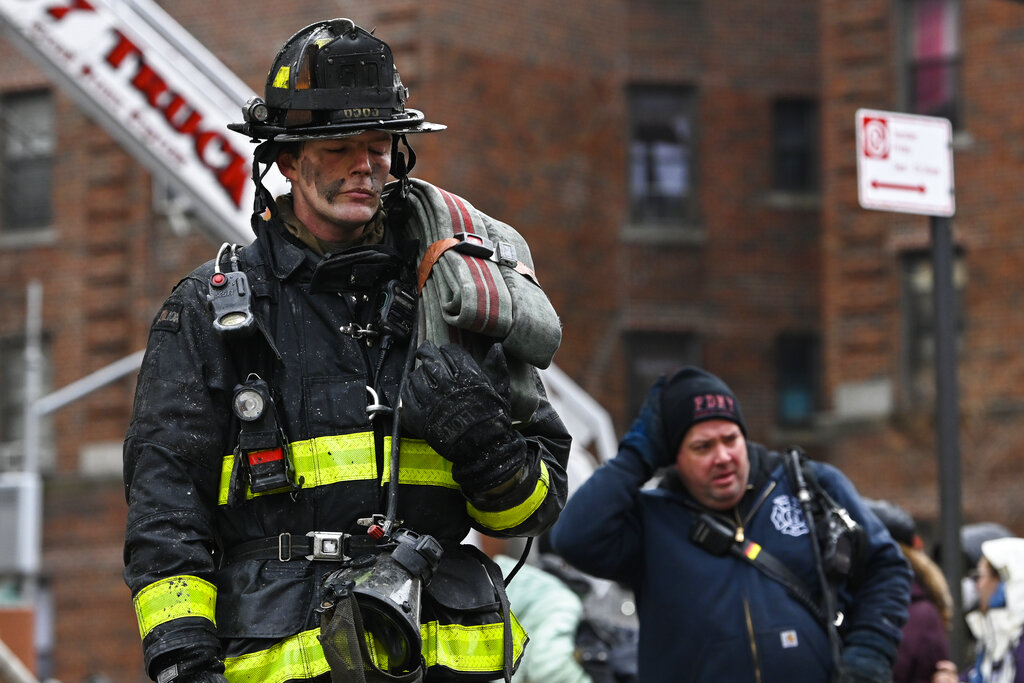 Emergency personnel respond to a high rise fire at 333 East 181 Street