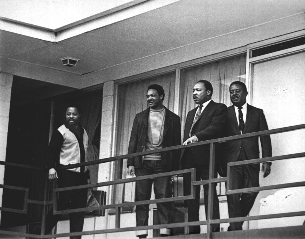 Rev. Martin Luther King Jr. stands with other civil rights leaders on the balcony of the Lorraine Motel in Memphis, Tenn., April 3, 1968, a day before he was assassinated at approximately the same place