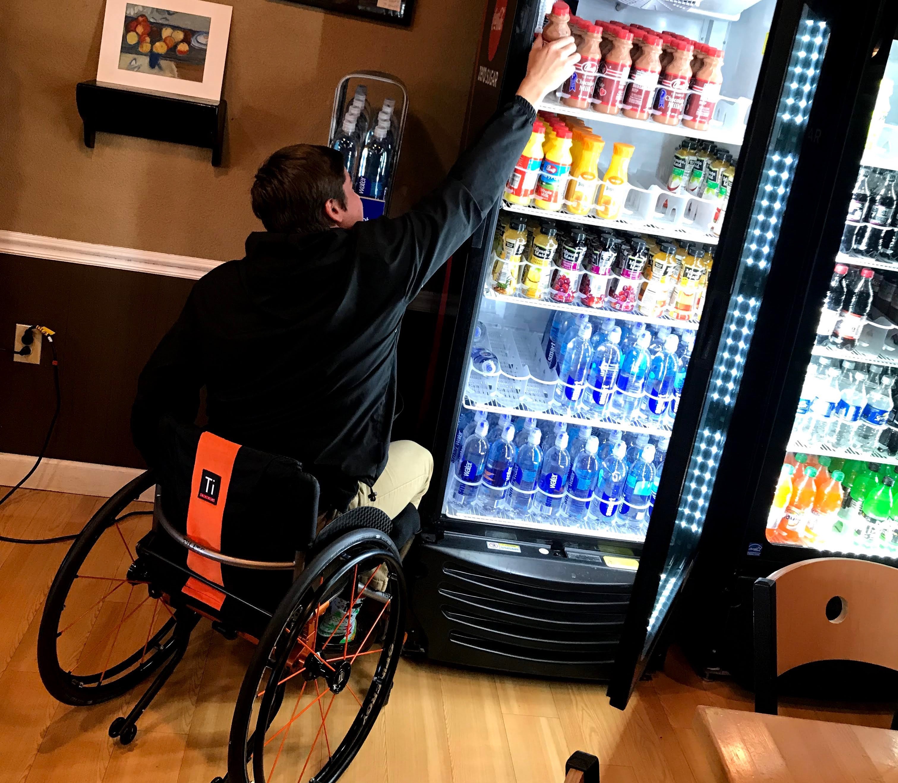 Student navigating vending machine 