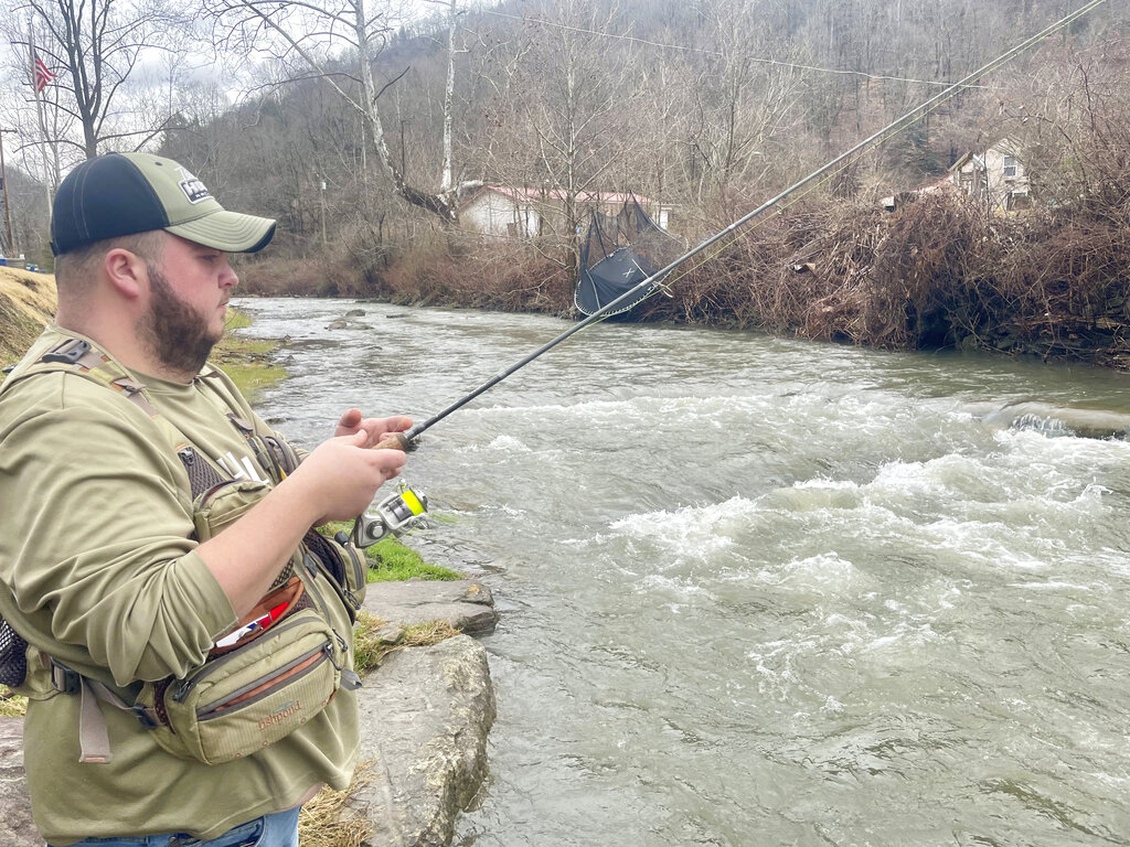 Man fishes along Buffalo Creek WV 