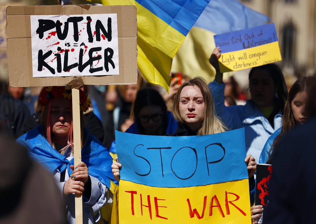People attend a pro-Ukrainian protest under the slogan "March for true Peace in Ukraine", in Berlin, Germany