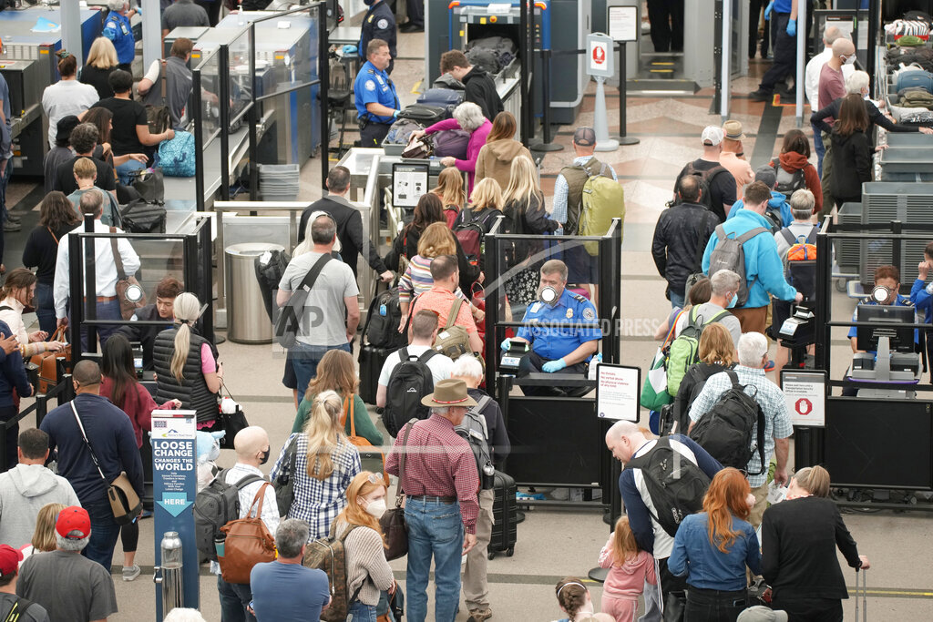 people checking in at airport