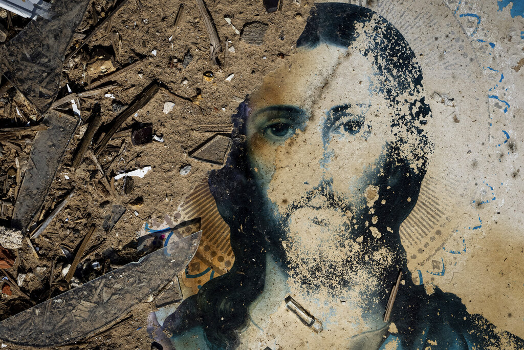 An icon lies in the debris of a church which was destroyed after Russian attack at the frontline in Mykolaiv region, Ukraine