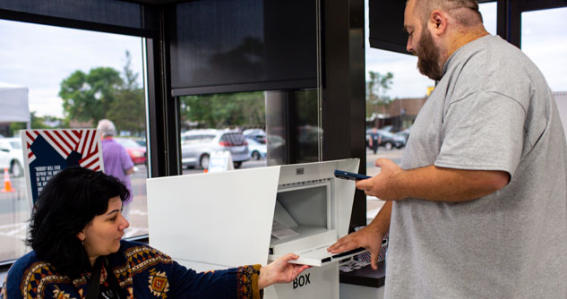 Woman taking a ballot