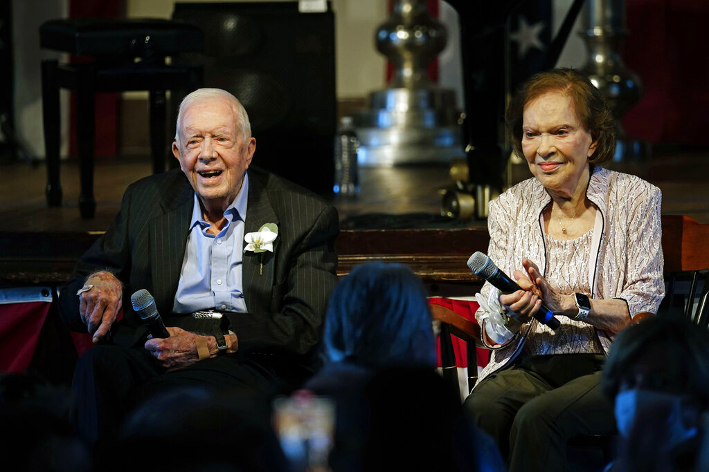 Former President Jimmy Carter and his wife former first lady Rosalynn Carter sit together during a reception to celebrate their 75th wedding anniversary Saturday, July 10, 2021