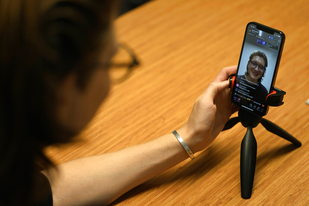 Russian YouTube vlogger Niki Proshin doing a livestream via a mobile phone, in Istanbul, Turkey