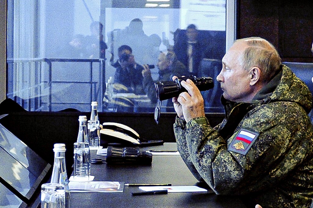 Russian President Vladimir Putin watches the Vostok 2022 (East 2022) military exercise in far eastern Russia