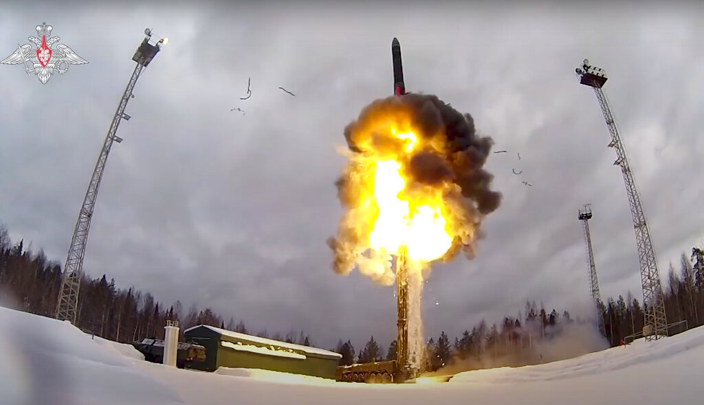 Yars intercontinental ballistic missile being launched from an air field during military drills