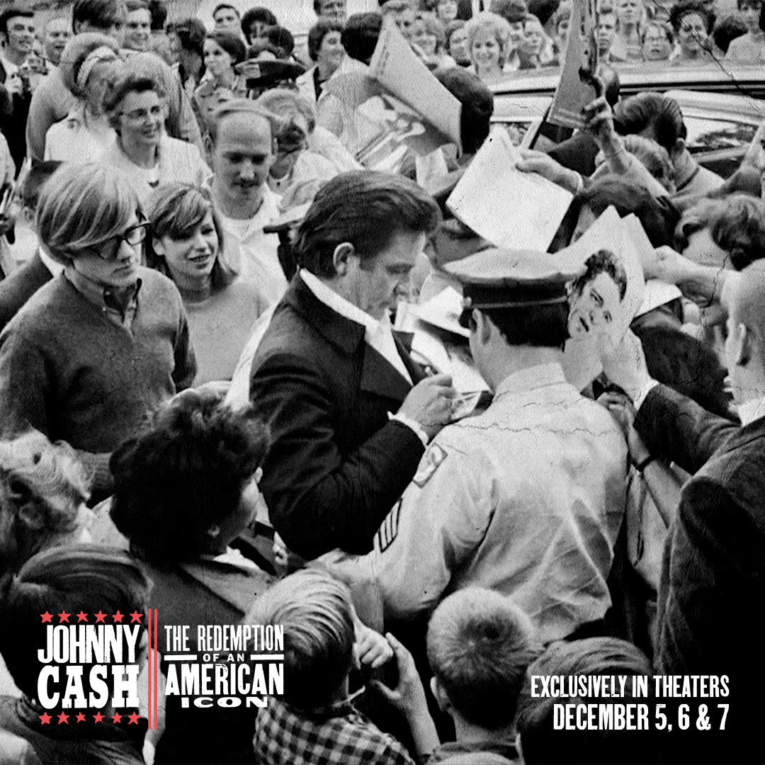 Johnny Cash signs autographs 