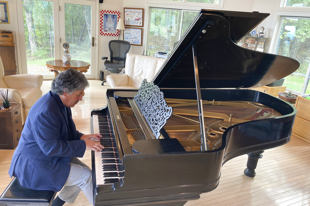 Robert Friedman plays a Steinway grand piano once owned by Thomas Edison, with possible bite marks from the inventor