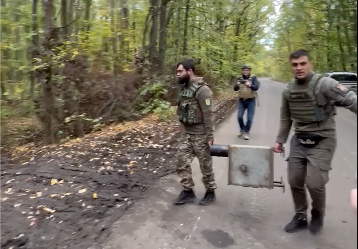 Ukrainian troops with wood stove