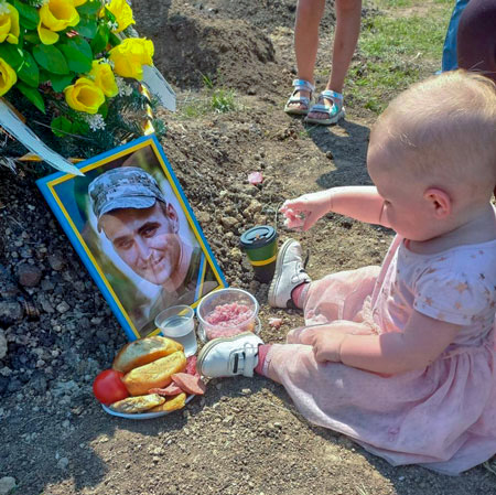 Ukrainian toddler marks her first birthday at late soldier father