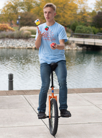 Thaddeus Krueger also successfully completed the Rubik’s Cube while juggling and riding his unicycle