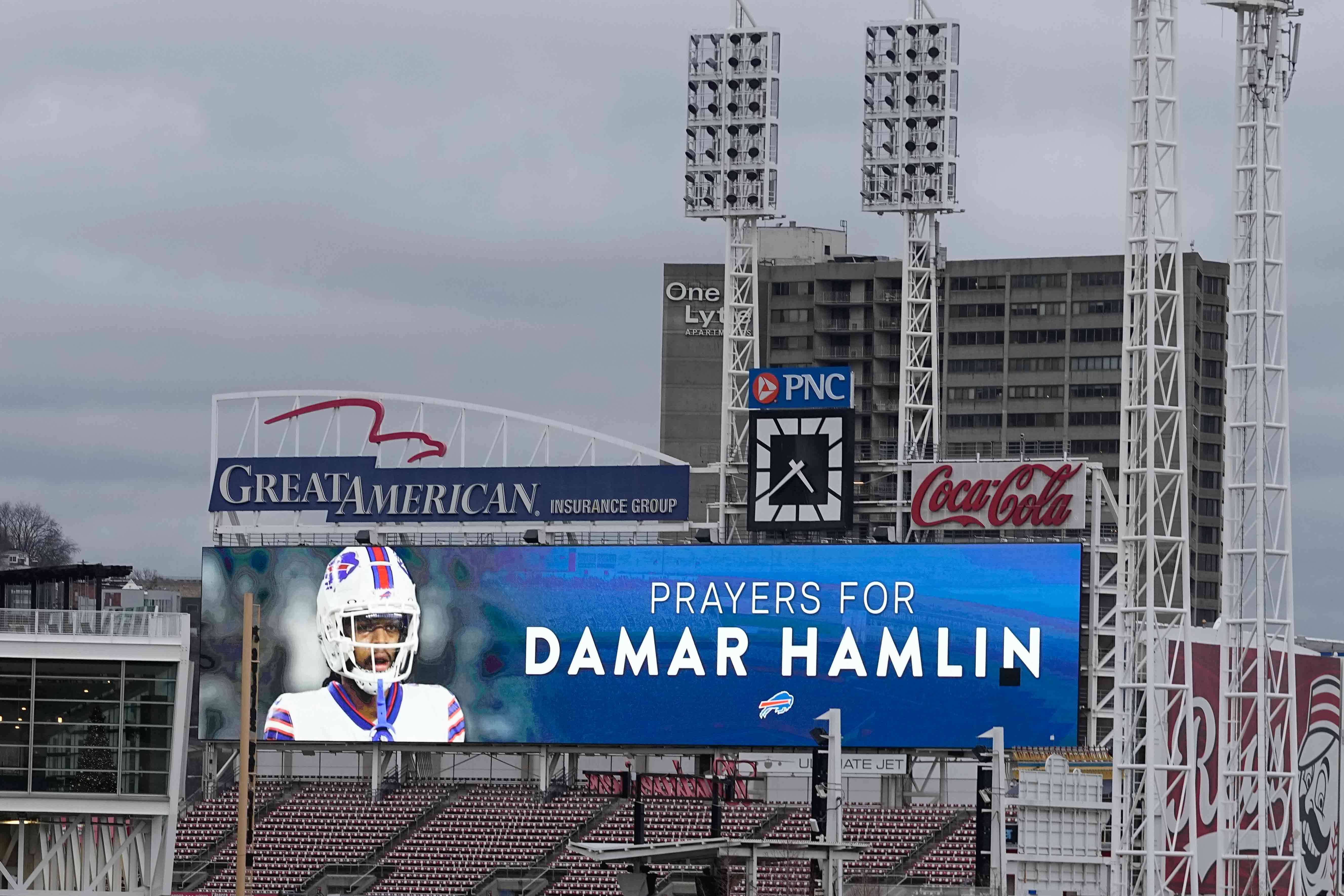 A scoreboard at Great American Ballpark displays a photo of Buffalo Bills