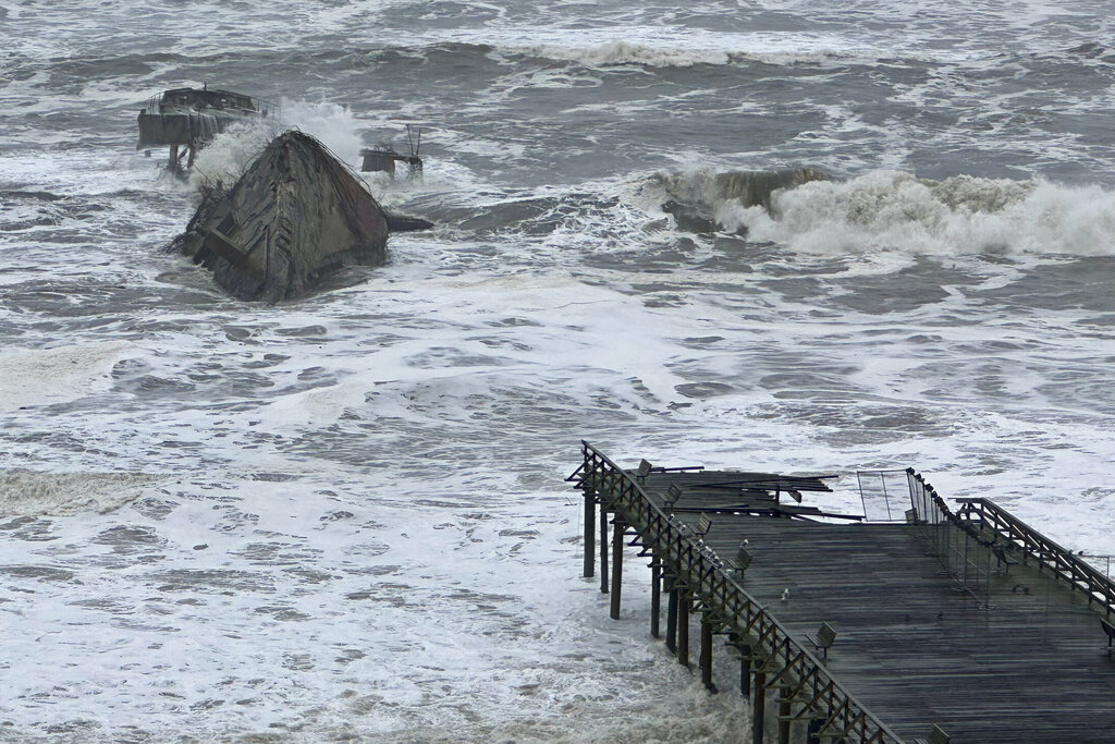 A section of the Seacliff State Beach Pier is decimated from heavy storm surf in Aptos, Calif. 