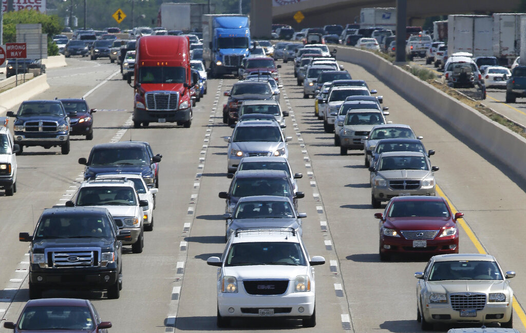 Drivers work their way out of Dallas during rush hour