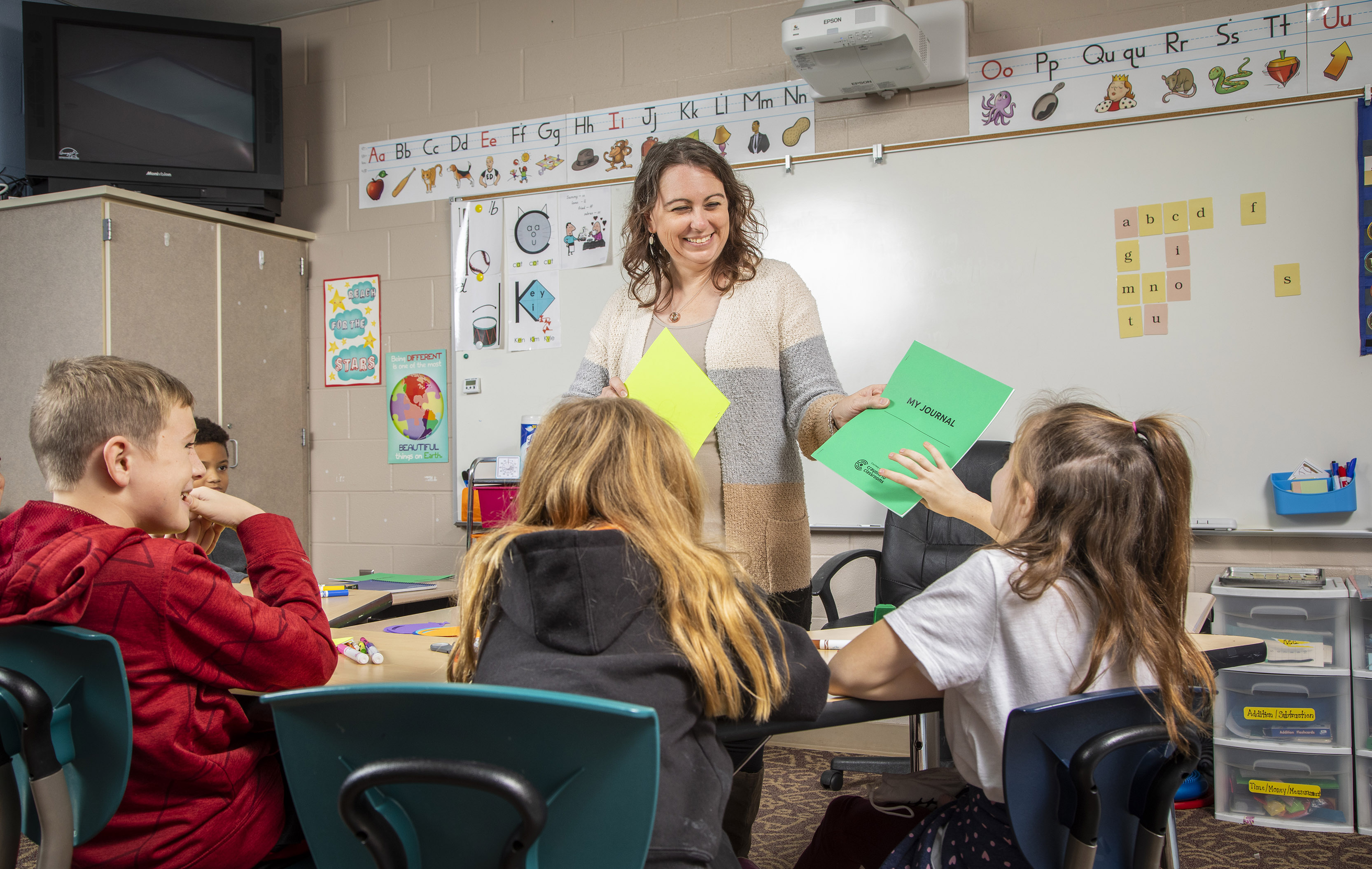 Teacher in a classroom with children