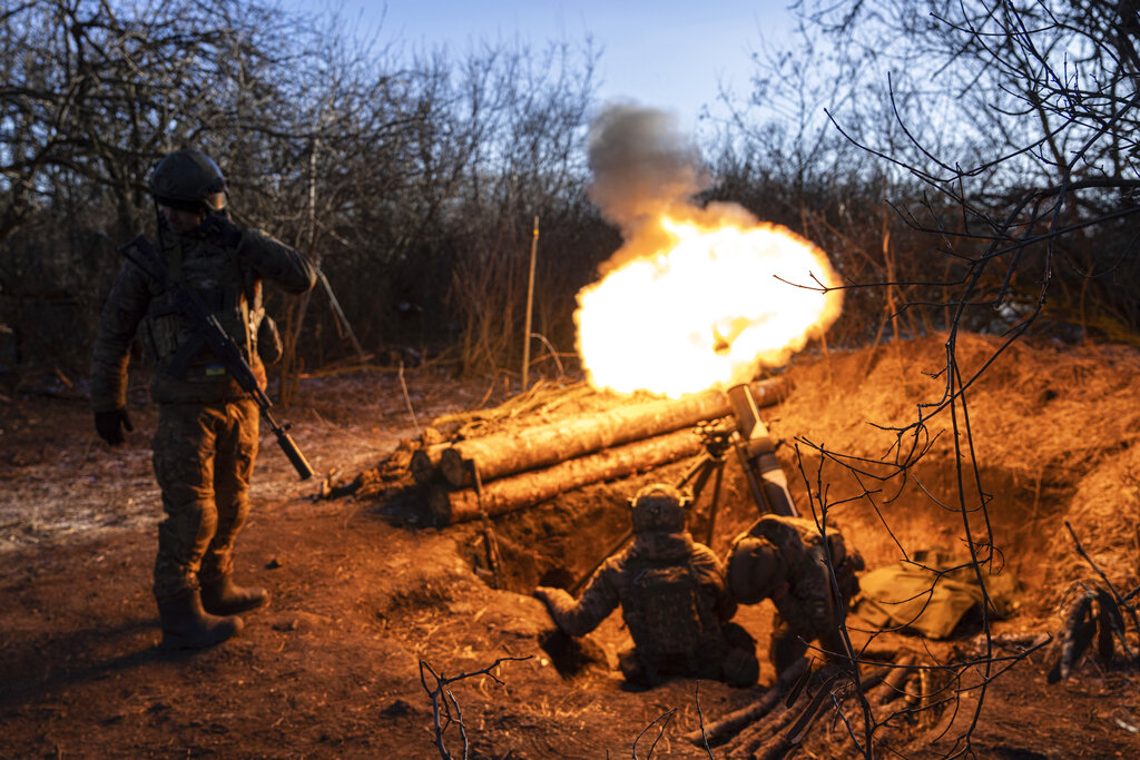 Ukrainian servicemen fire by a Finnish 120 mm mortar towards Russian positions at the frontline near Bakhmut, Donetsk region, Ukraine