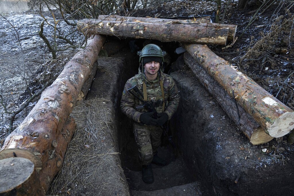 A Ukrainian serviceman stands at his position at the frontline near Bakhmut, Donetsk region, Ukraine