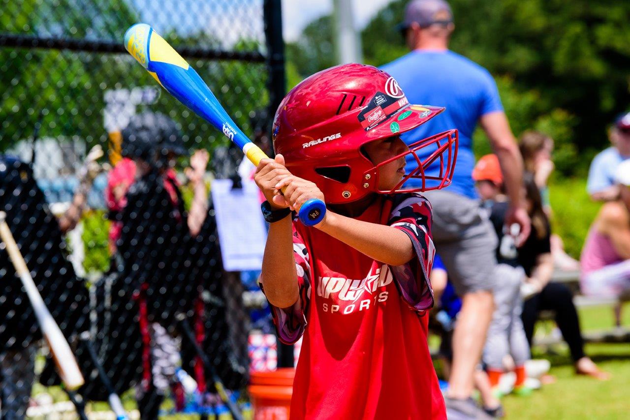 Child playing baseball