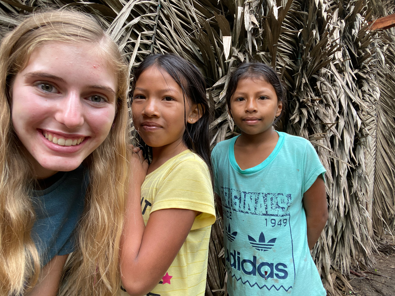 . Sarah-Kate Drown spends time with young children in Ecuador