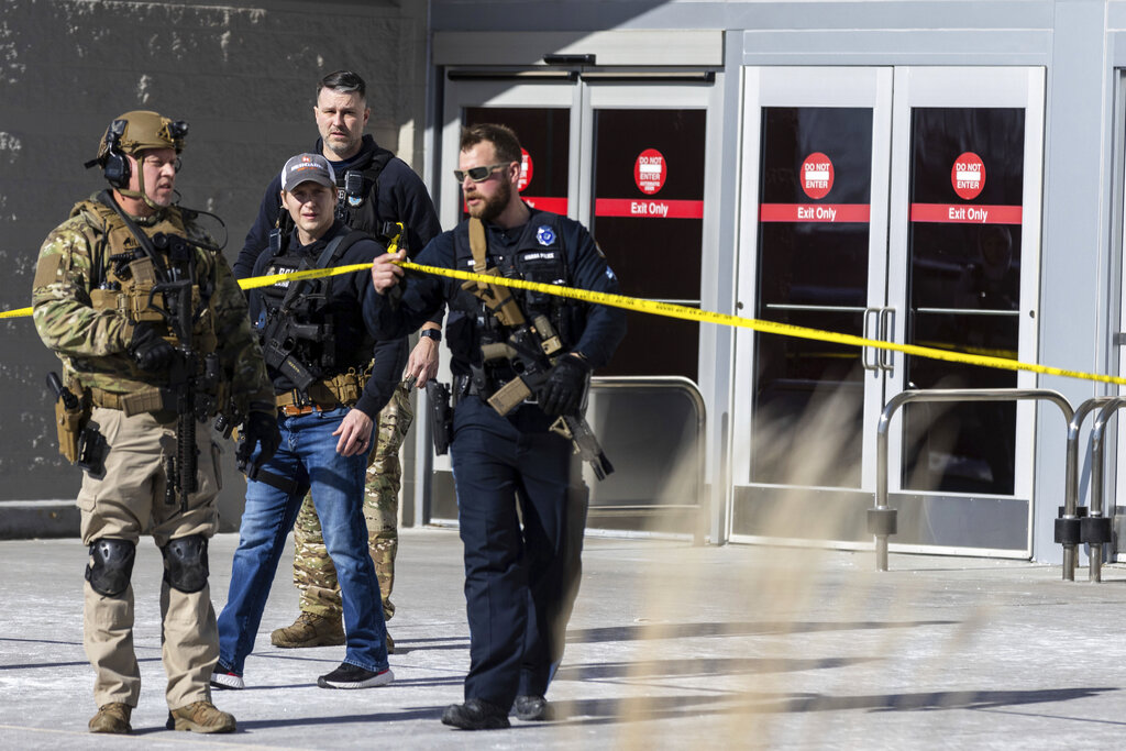 Law enforcement officers are pictured at the scene of a shooting at a Target store in Omaha, Neb.