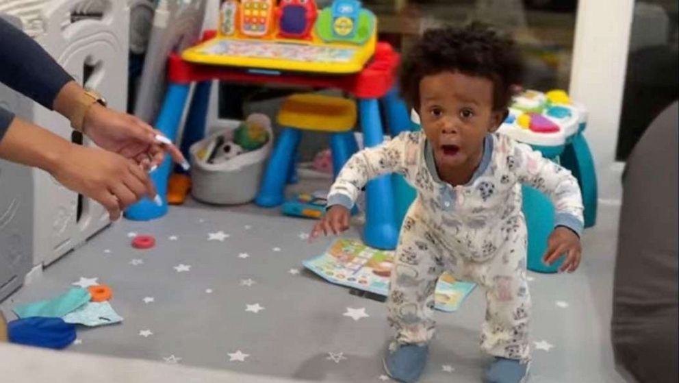 Shocked little boy finds out that he can walk