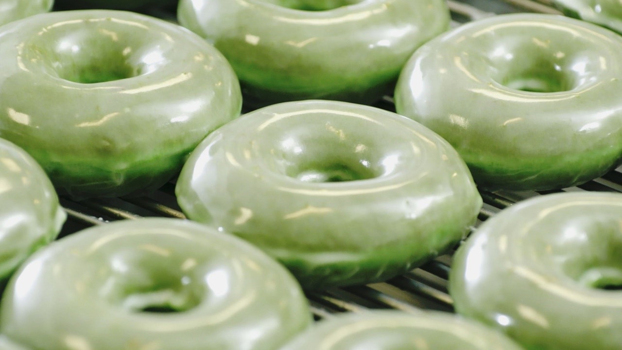 Glazed donuts covered in green frosting