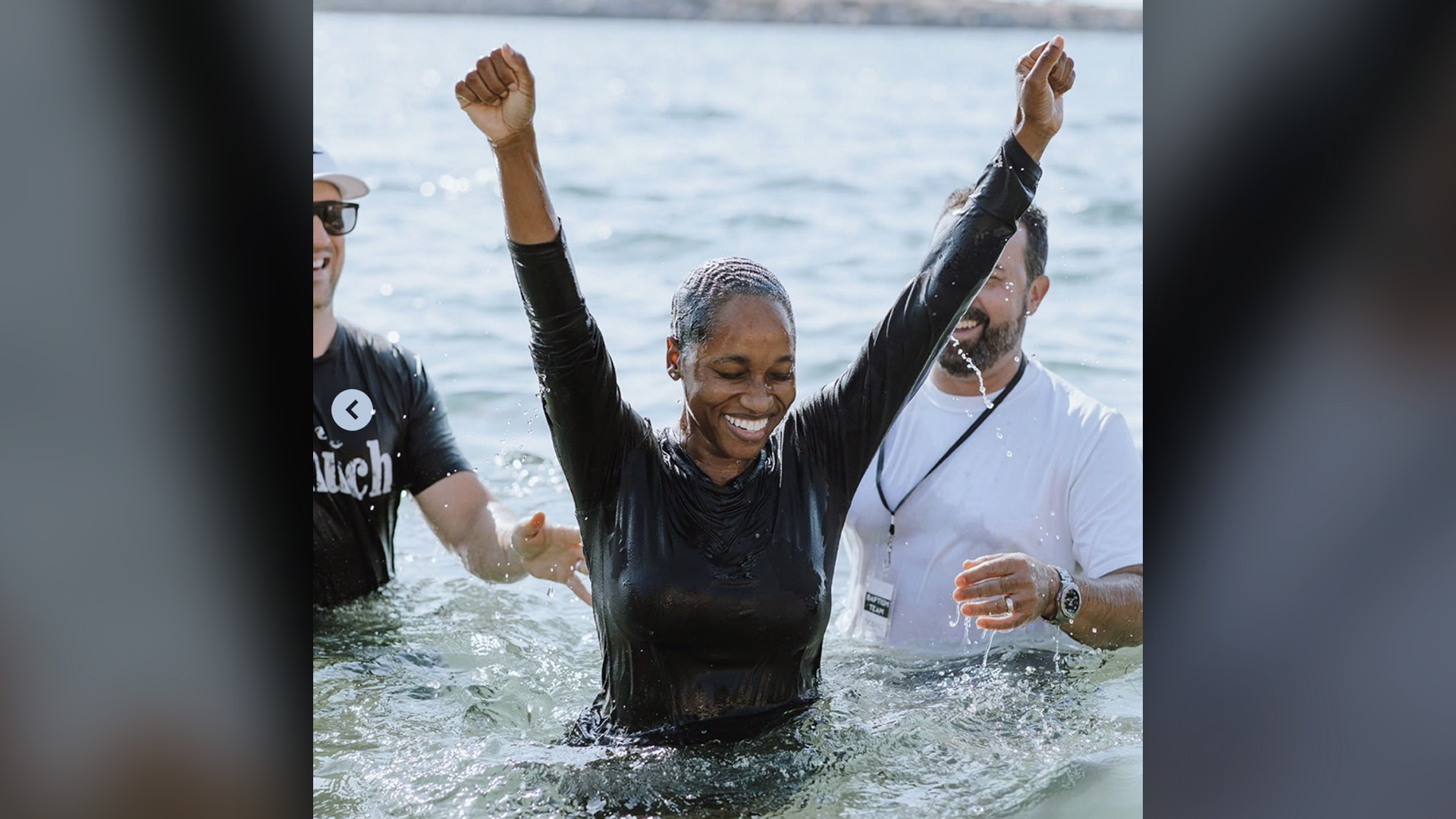 Woman baptized at beach