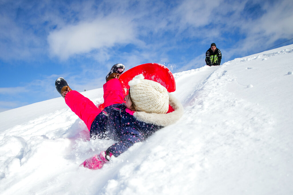 Emma Hart, 5, wipes out halfway down the hill 