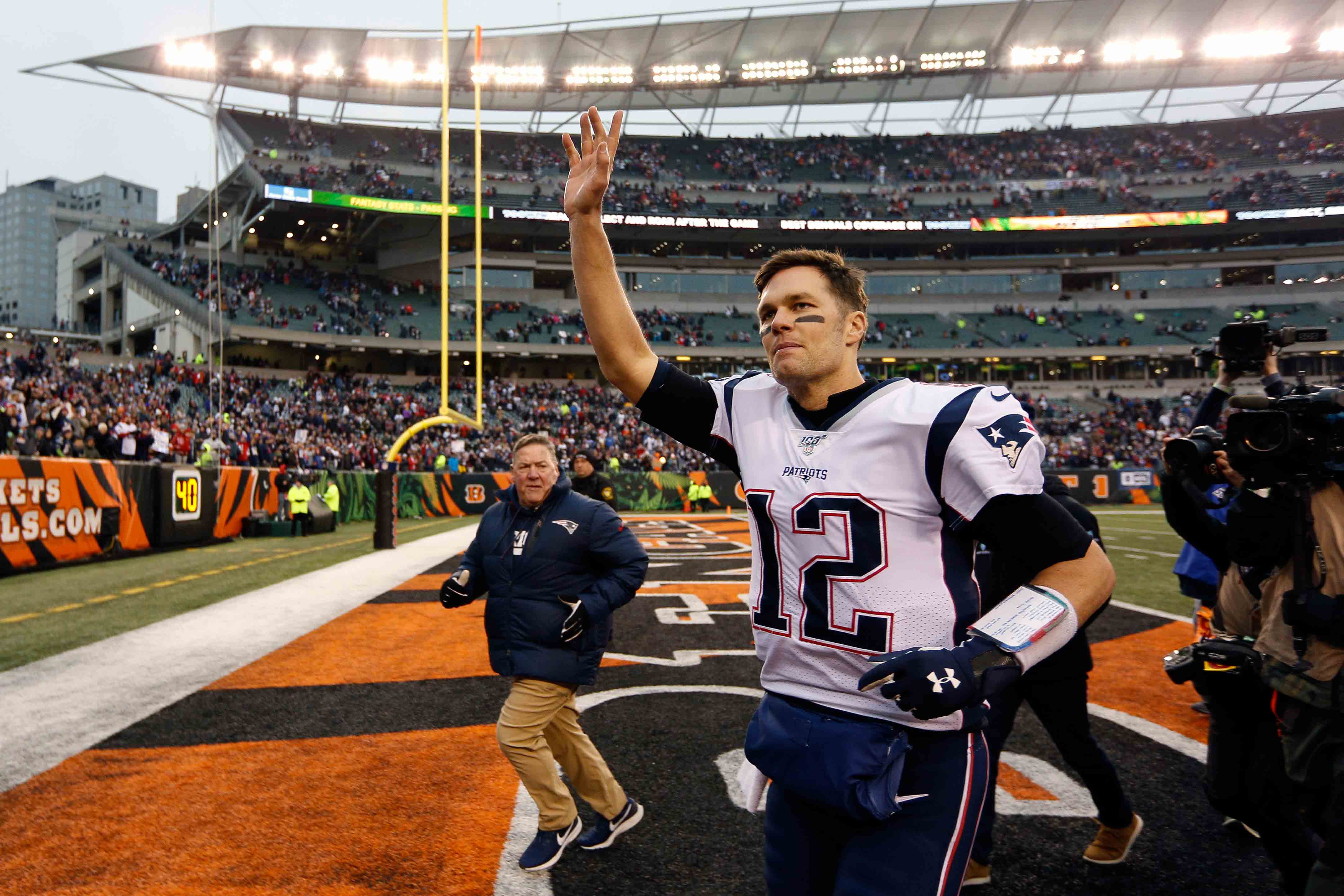 New England Patriots quarterback Tom Brady (12) waves to the crowd after an NFL football game against the Cincinnati Bengals